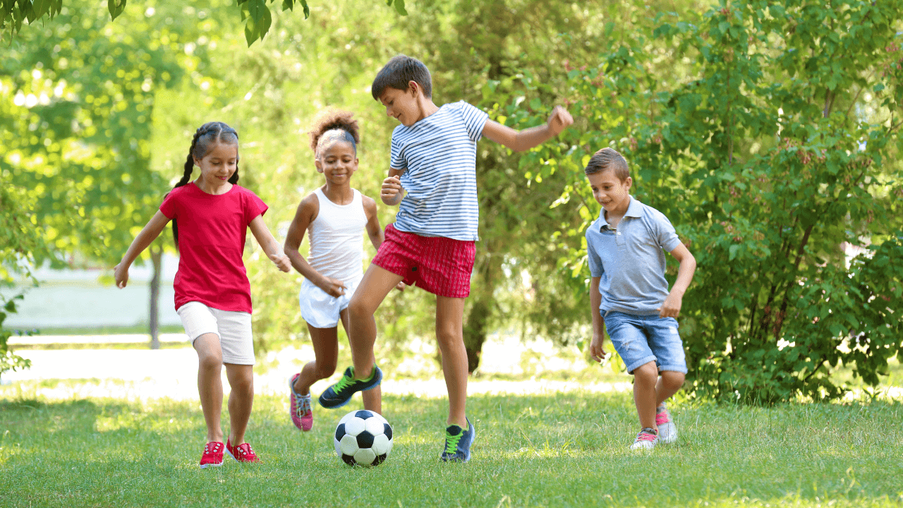 kids playing soccer outside